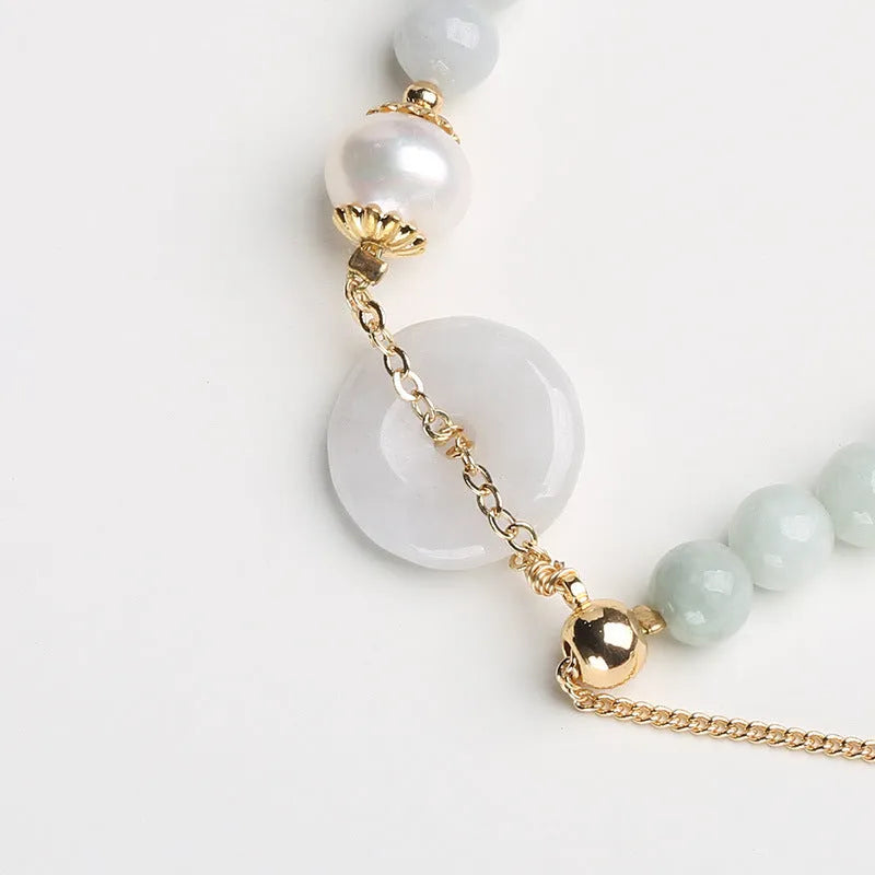 Handmade jade pearl bracelet with natural emerald peace buckle and geometric national style design