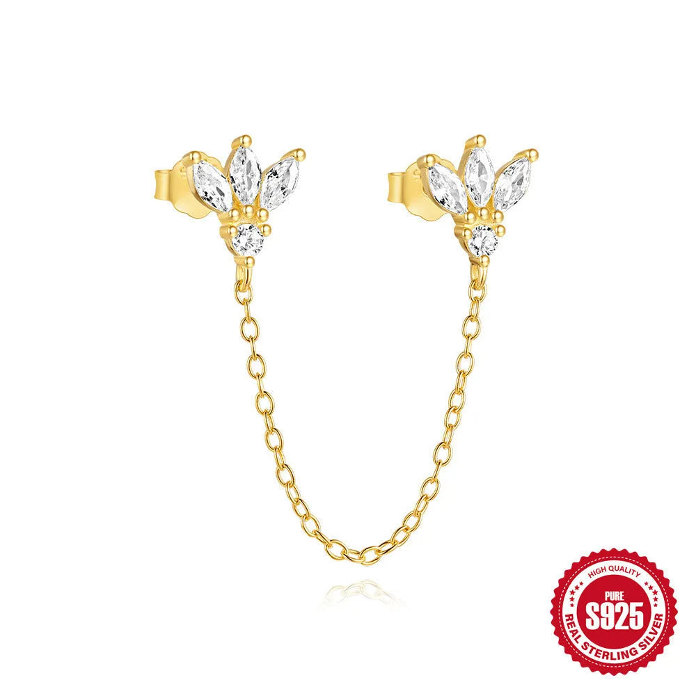Close-up of a golden double ear piercings chain design stud earring made from S925 sterling silver with inlaid zircon stone.