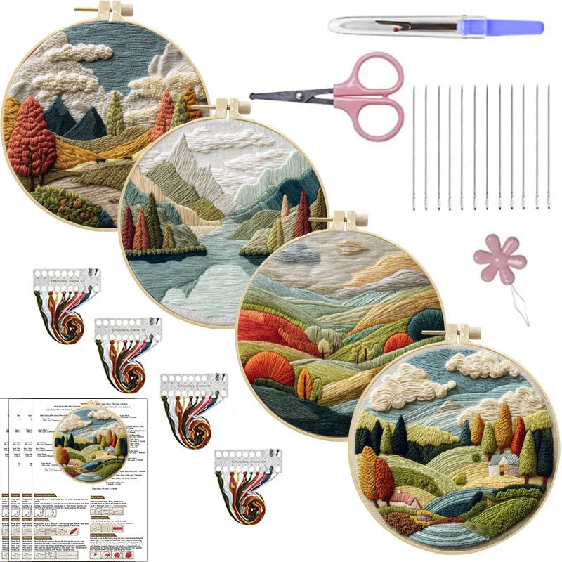 DIY embroidery kit with landscape-printed cotton fabric, embroidery hoop, needles, and coloured thread spools.