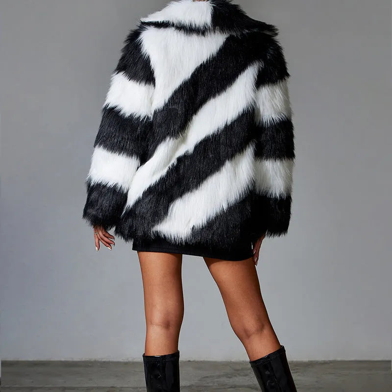 Women's faux fur coat with contrast lapel and fur collar in mid-length design