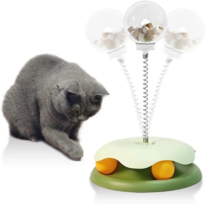 Blue and green options of a round plastic cat treat dispenser toy with a track ball, shown dismantled.