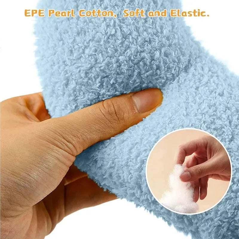 Small white U-shaped plush pet pillow for cats and small dogs on a neutral background.