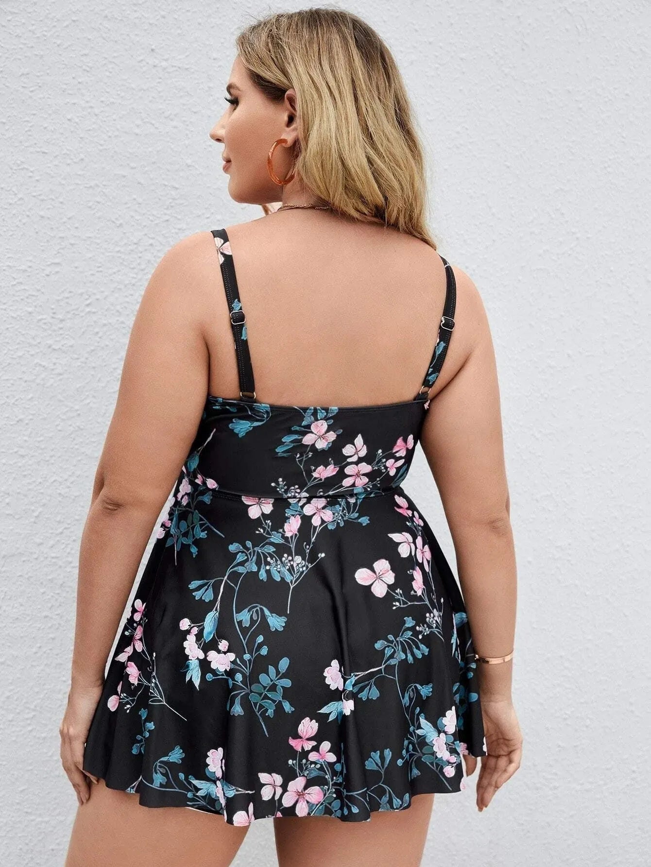 Women's floral print one-piece swimsuit with split colour design in plus sizes.