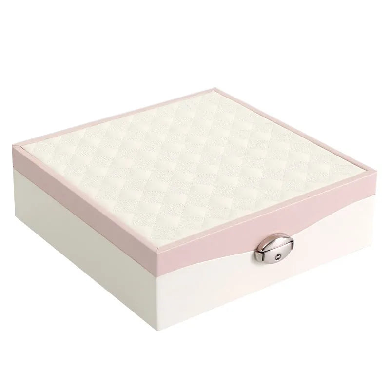 Red and white PU leather jewellery storage box with multiple compartments for necklaces and rings