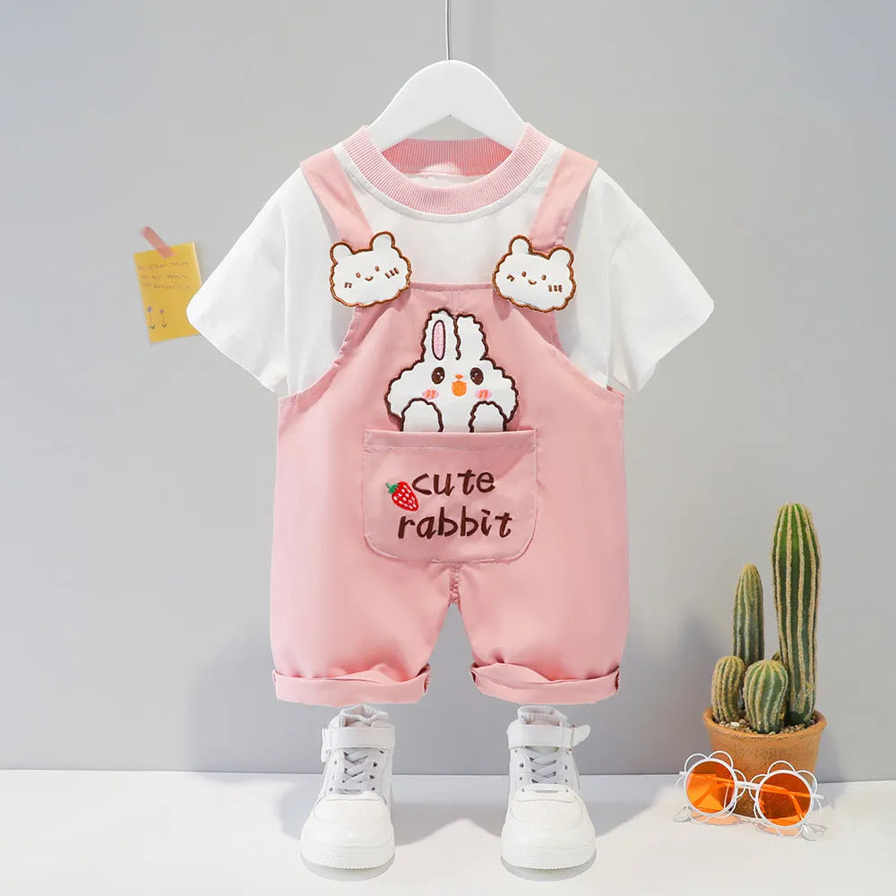 A yellow cotton baby overalls with a cartoon print, featuring short sleeves and openable straps.
