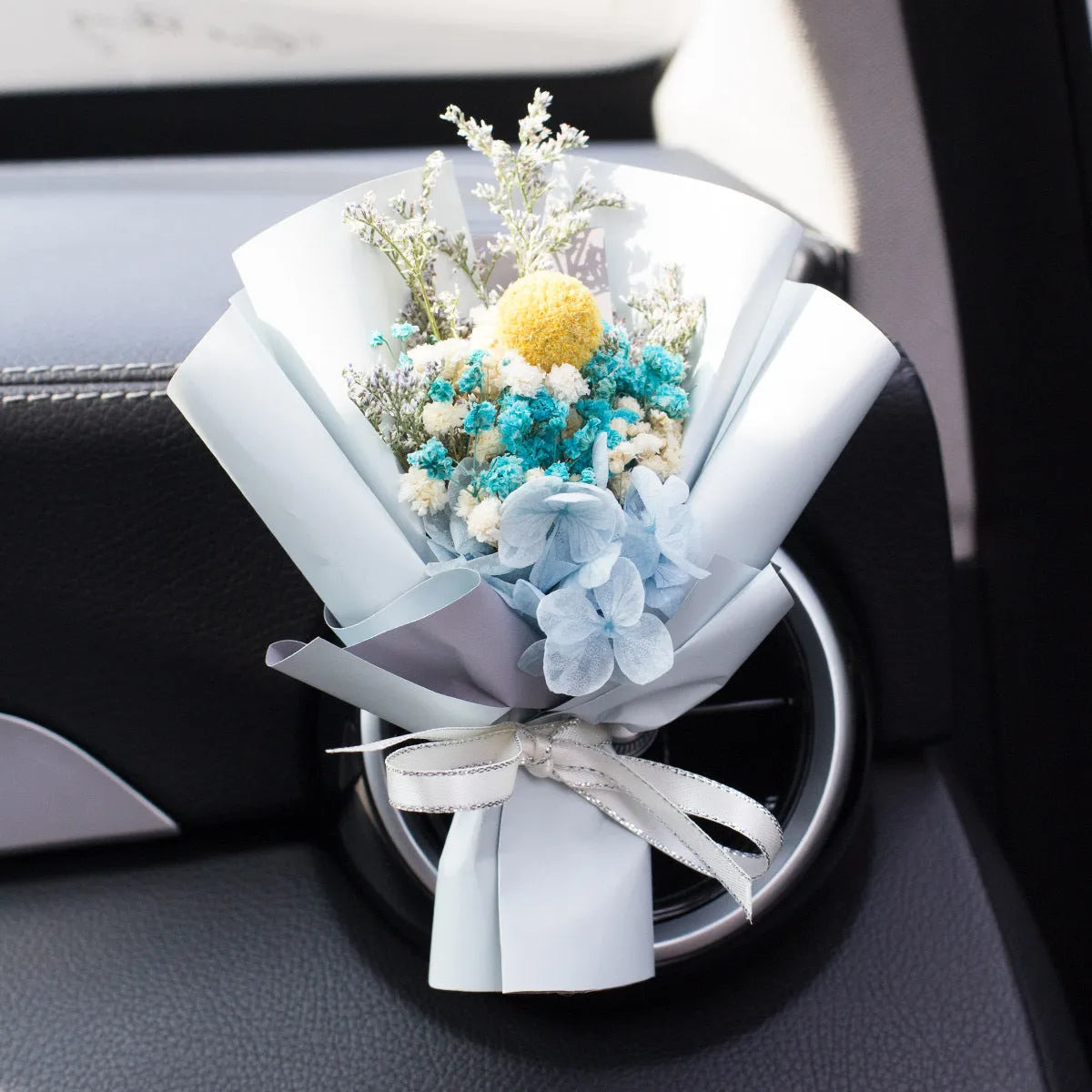 Handmade dried flower car vent ornament with interchangeable scented discs in multiple colour options
