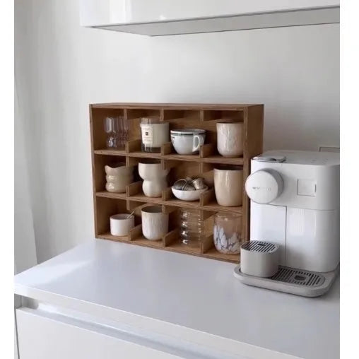 Square solid wood storage rack with multiple grid tiers in a natural birch wood finish.
