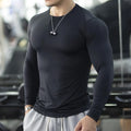 Men's long sleeve fitness tights in black or white solid colour athletic compression wear