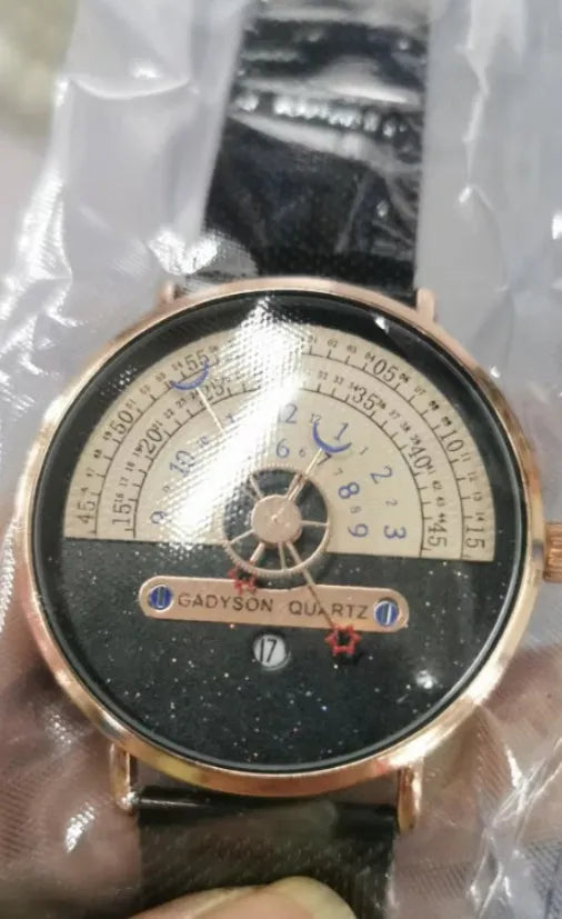 Men's gold sport watch with 40mm dial and stainless steel strap showing 24-hour display