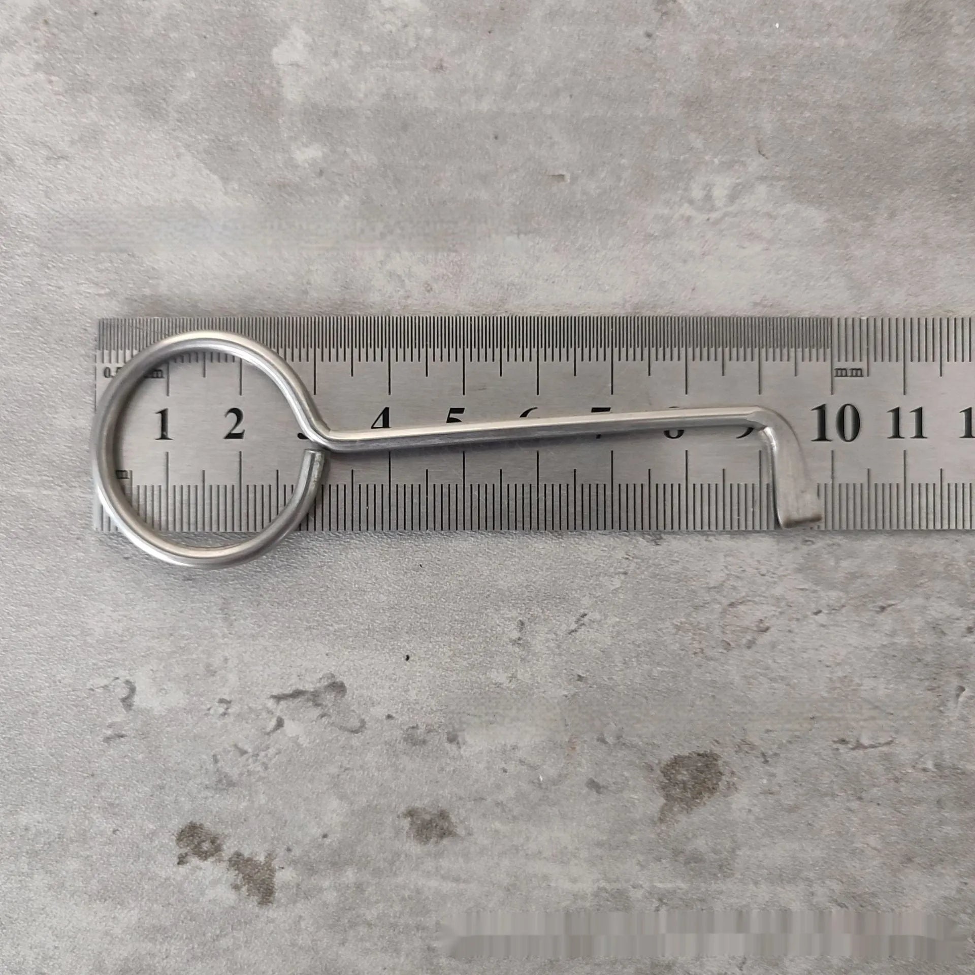 Two alloy wrench tools from a portable universal family toolkit set on a white background.