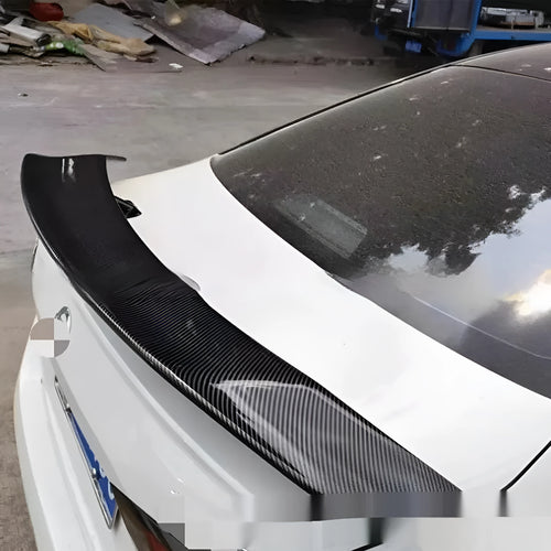 Universal car punch-free tail wing spoiler in ABS plastic with four finish options