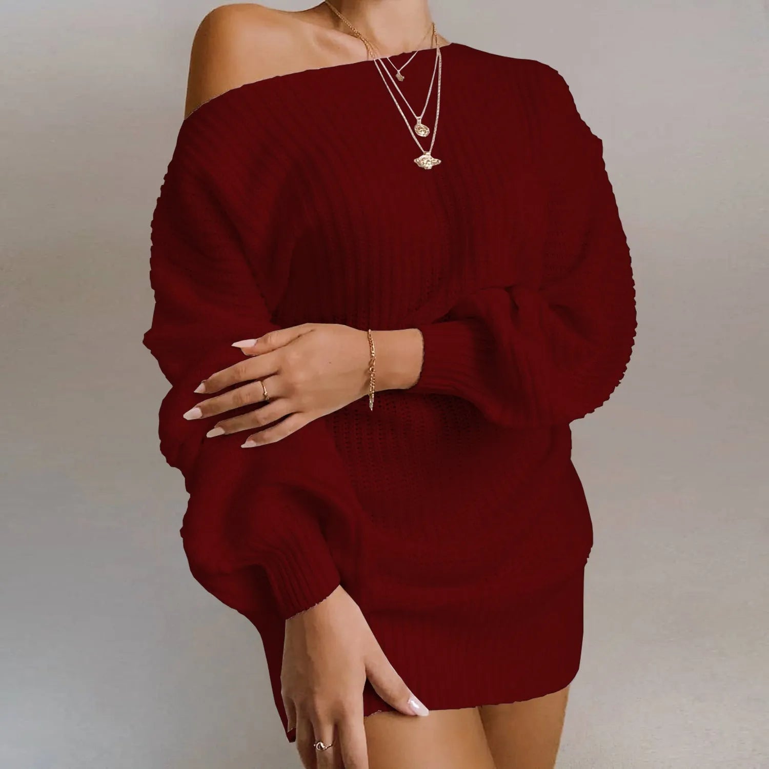 Women's knitted dress with lantern sleeves and off-shoulder neckline in solid colour