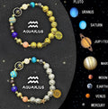 Set of two natural stone beaded bracelets with twelve different zodiac sign designs.