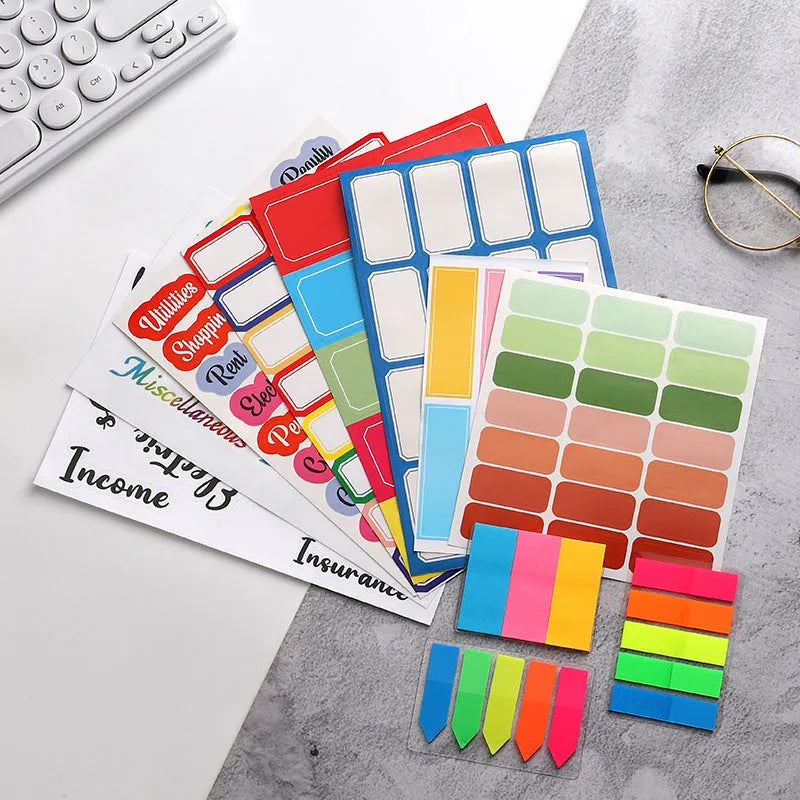 Assorted adhesive stickers and sticky notes showing grid formats and colourful designs with A6 ruler versions