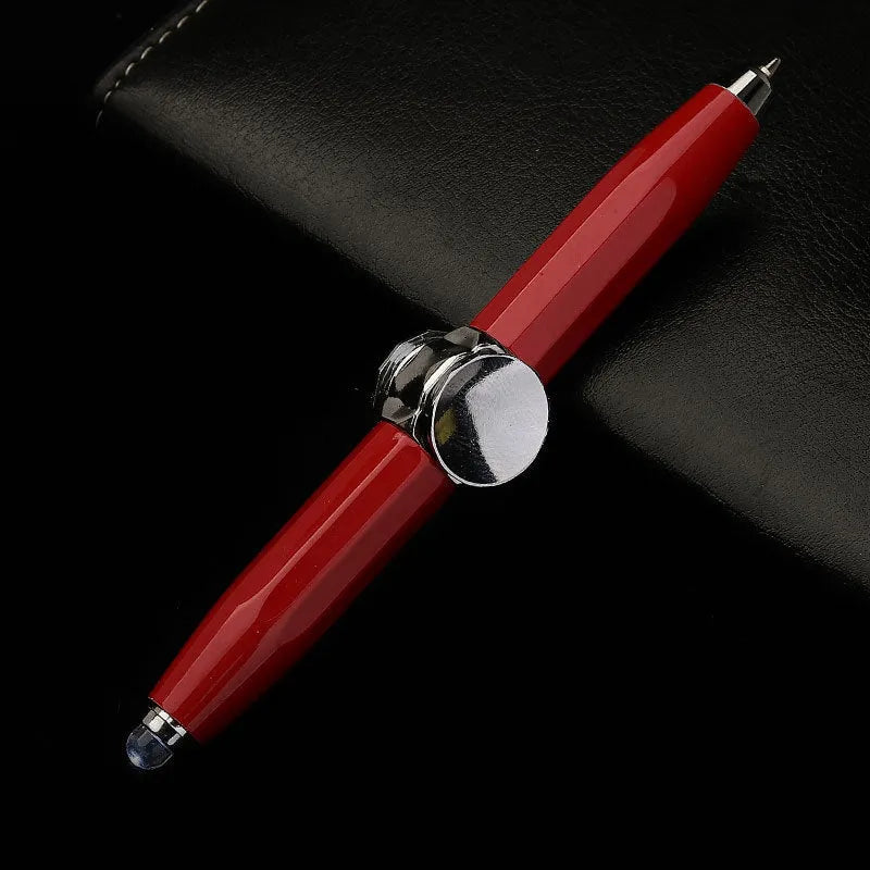 Metal ballpoint pen with integrated fingertip spinner and LED lights, shown in hand