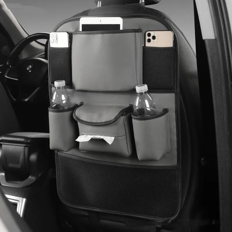 Genuine leather car seat back storage bag in four colour options hanging behind car seat