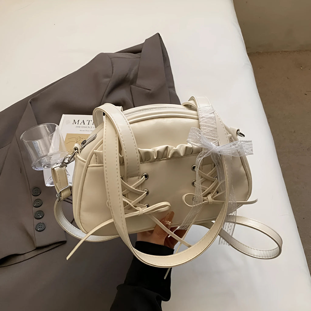 Women's casual PU shoulder handbag with a bandage bow and phone compartment in multiple colour options.