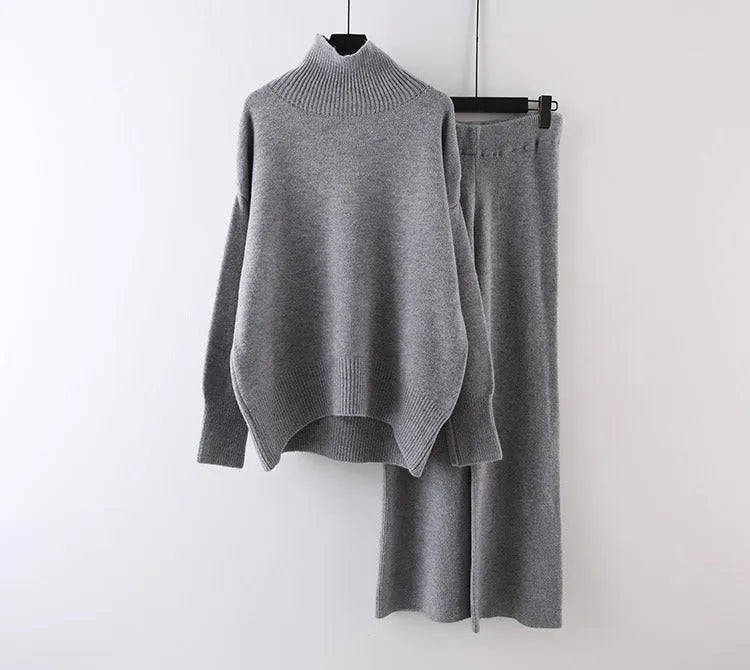 Women's casual two-piece set featuring a long sleeve sweater and wide leg trousers in a solid colour.