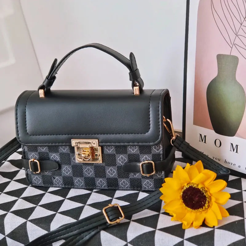 Retro square crossbody bag with ethnic floral stitch patterns and horizontal suitcase shape