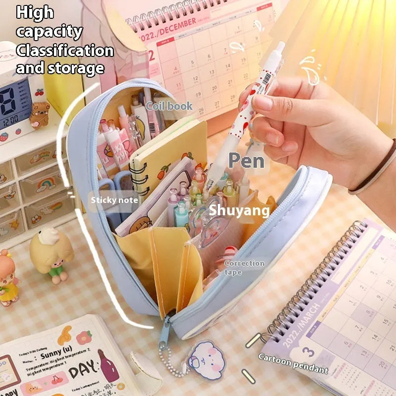 Transparent PVC pencil case with cartoon pattern, showing large capacity design for stationery storage
