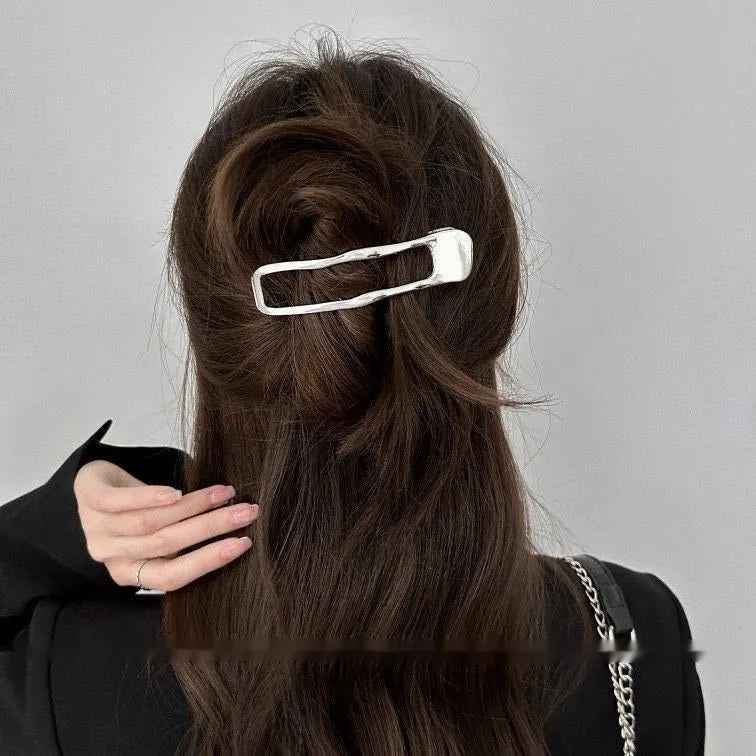 Zinc alloy hair barrettes in geometric shapes with gold and silver polished finishes