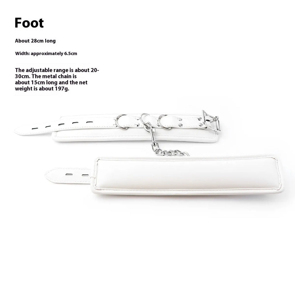 White PU sponge bondage set showing soft handcuffs, an ankle cuff, and a neck restraint.