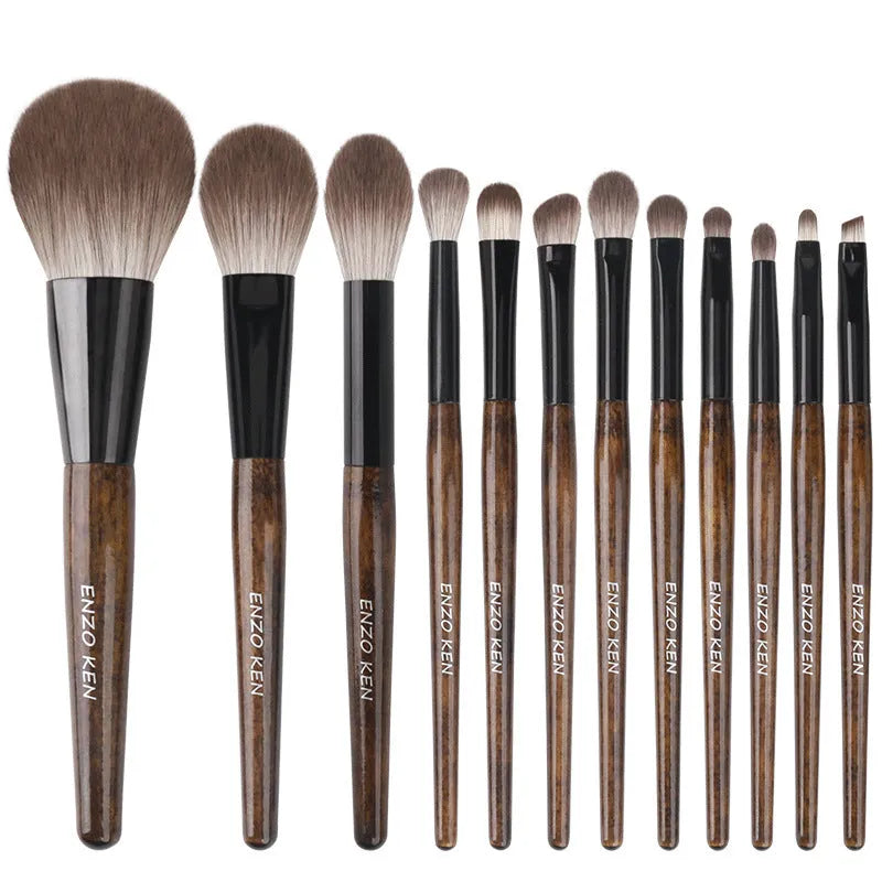 12 makeup brushes with wooden handles in a grey PU storage case, including powder foundation brush