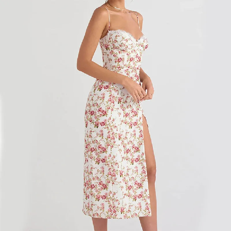 Women's long blue dress with lace flower print and slit suspender design.