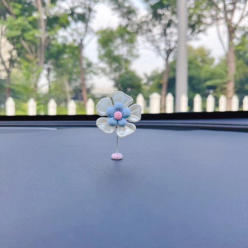 Plastic car swing decoration in choice of five colours measuring 5cm high