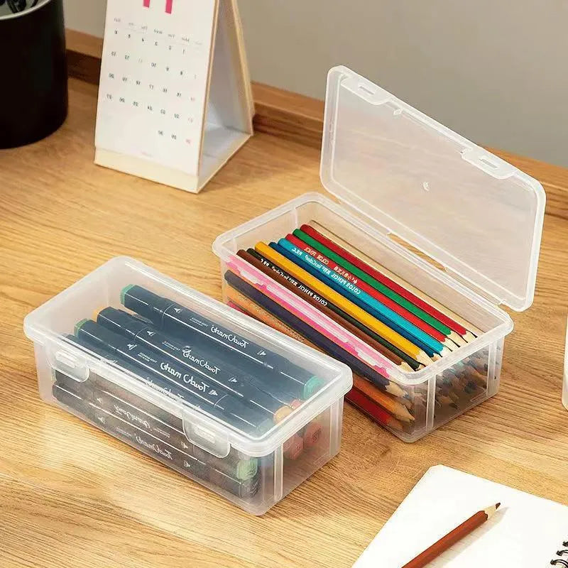 Clear plastic pencil storage box filled with coloured pencils and crayons