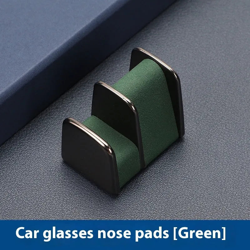Car dashboard glasses holder clip in leather-covered zinc alloy, showing colour options