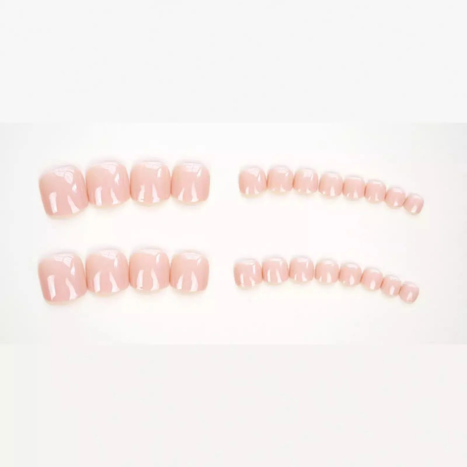 Fashion personality plastic toe nail stickers in skin colour with glue bottle for application.