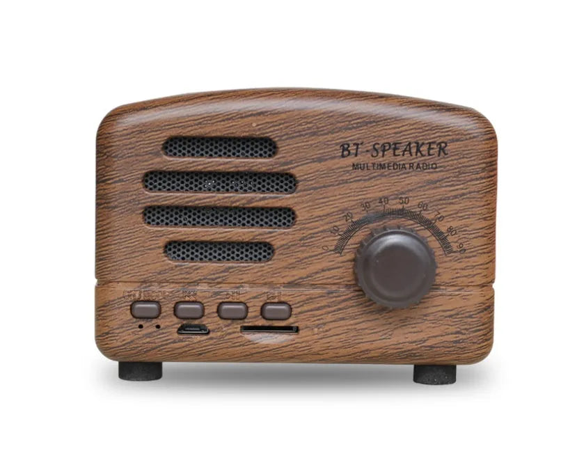 Wood grain finish bluetooth speaker showing compact design with USB charging port