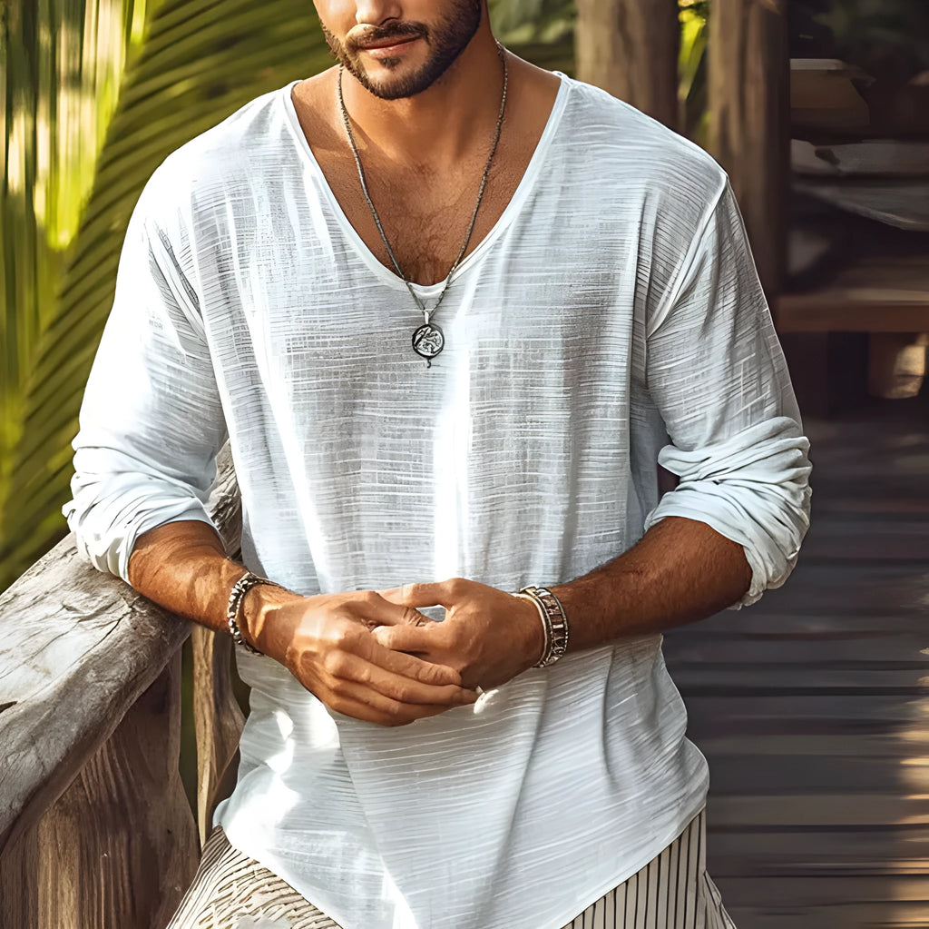 Beige slim fit long sleeve v-neck t-shirt laid flat, showing solid colour and fabric texture.