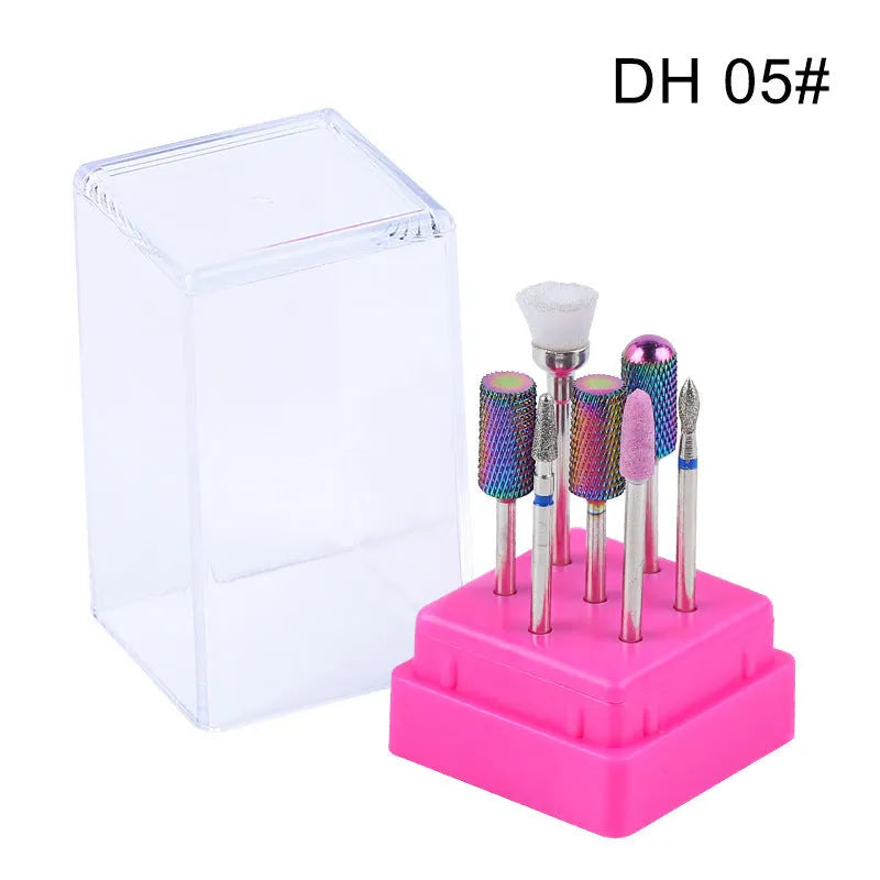 Set of seven tungsten steel nail drill bits and a brush in a clear plastic case.