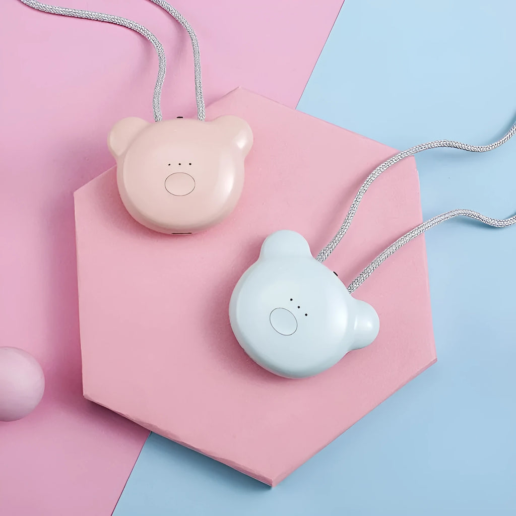 Mini USB portable air purifier necklace in pink, showing compact design with a wearable collar.