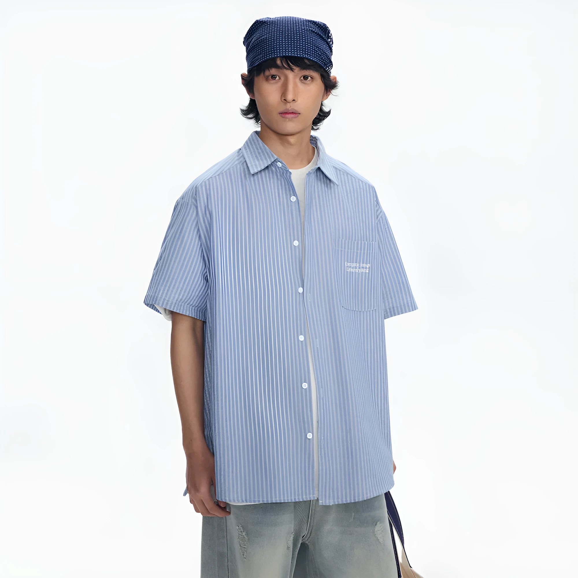 Blue and white striped loose-fitting short-sleeve cardigan shirt on a hanger