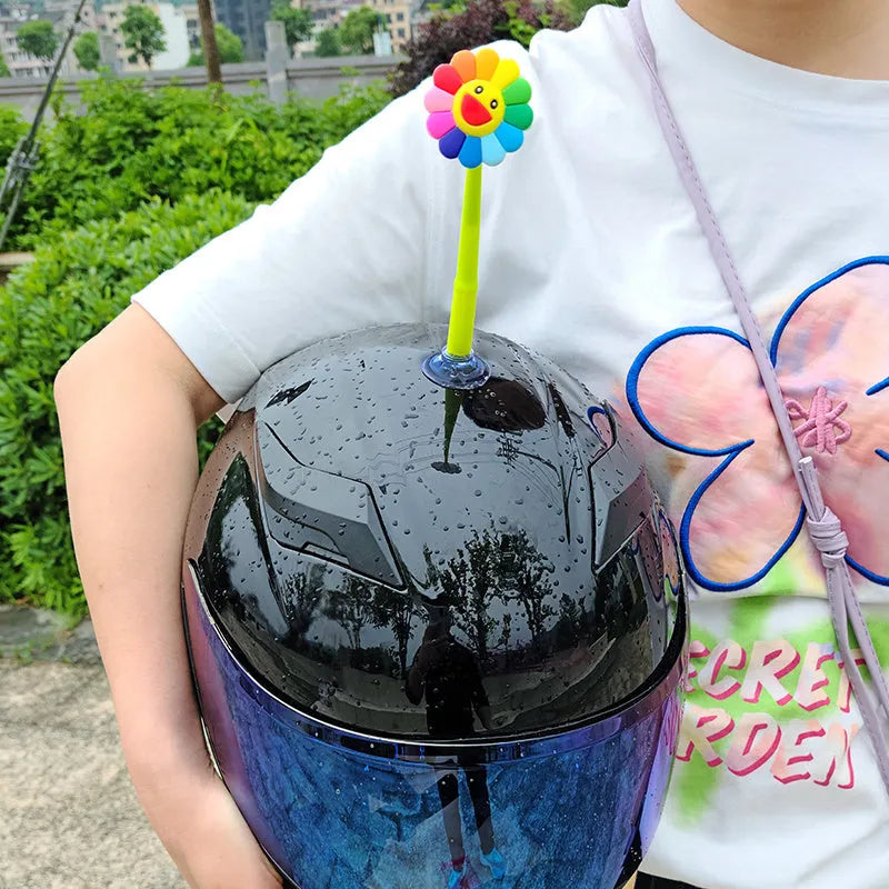 Silicone sunflower helmet decoration with suction cup on a motorcycle helmet.