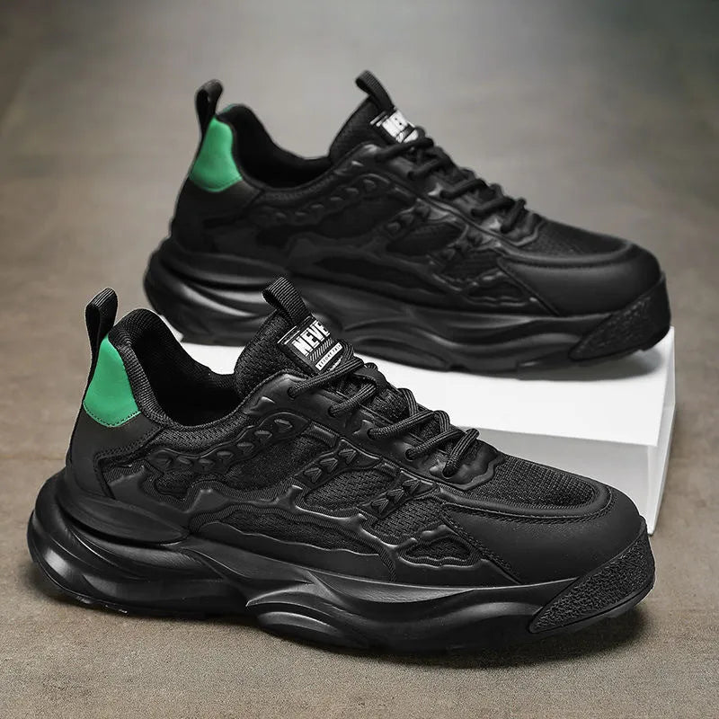 Men's white and black breathable mesh sports shoes with round toe design.