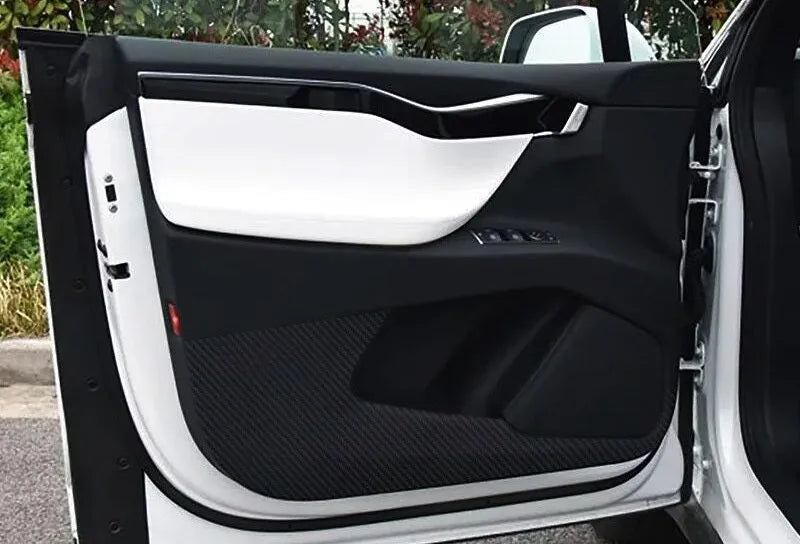 Four-piece carbon fibre protective film set for Tesla Model S front and rear interior door panels