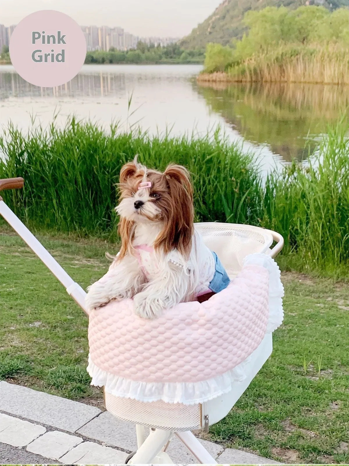 Pet stroller three-piece cushion set with removable cloth towel, pillow and pad in floral pattern.