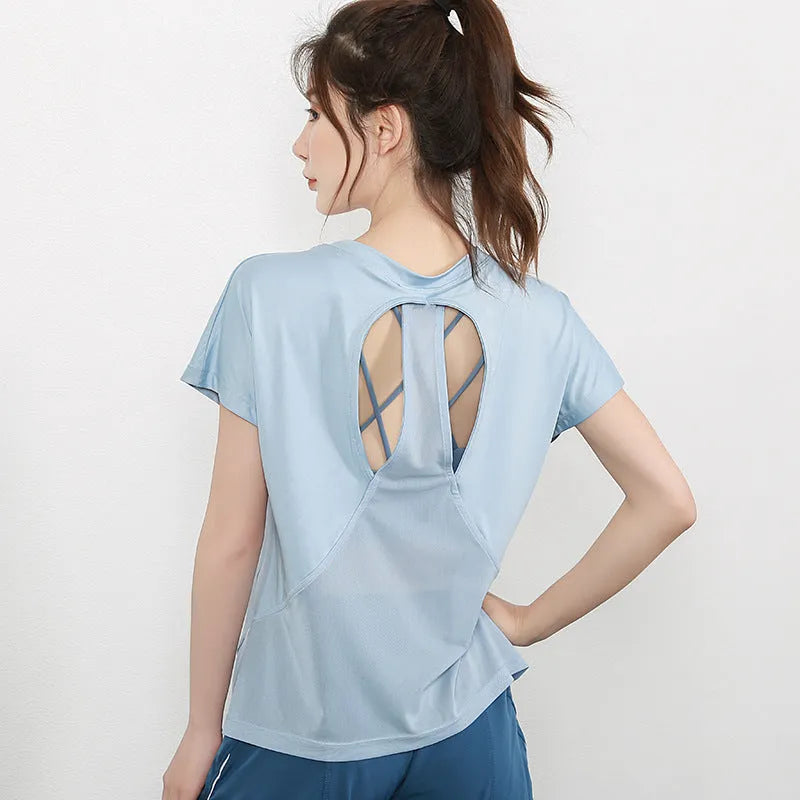 Women's short sleeve polyester sports t-shirt in sky blue, shown front view.
