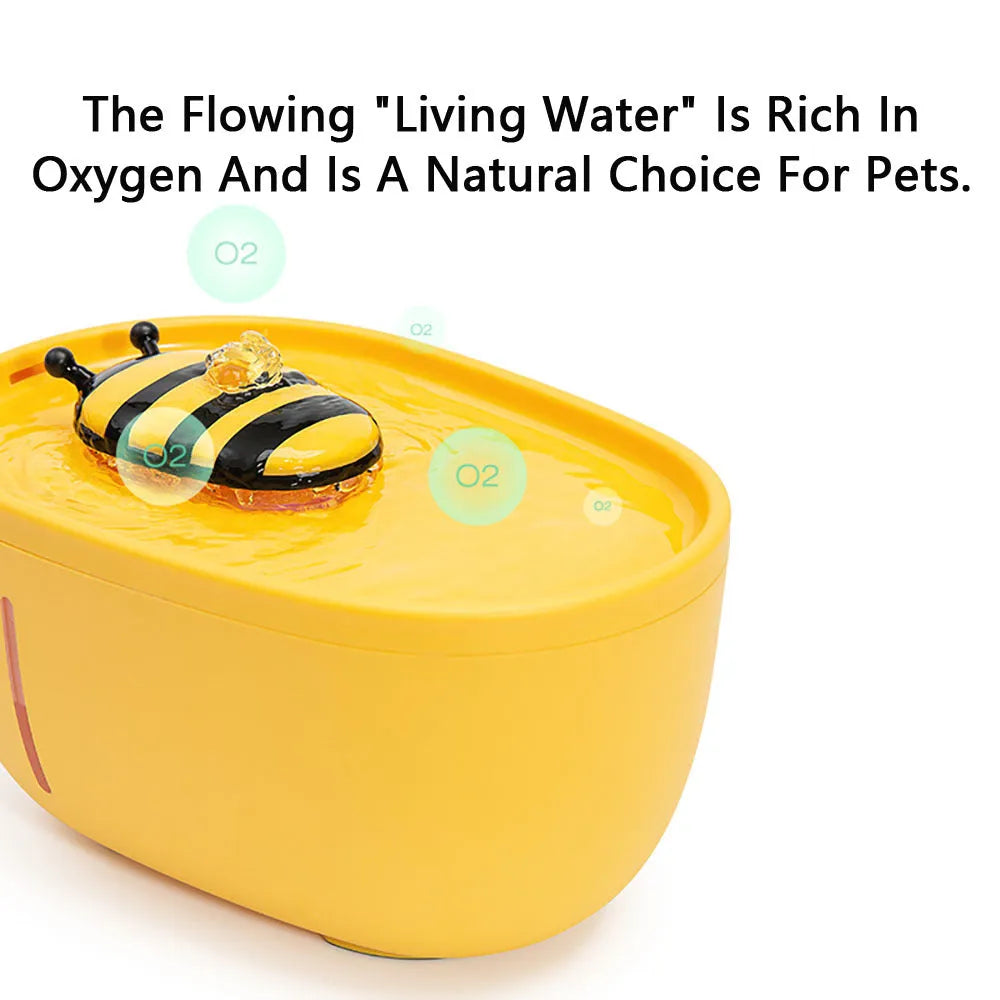 Yellow cat water fountain with filtration system and USB power cable