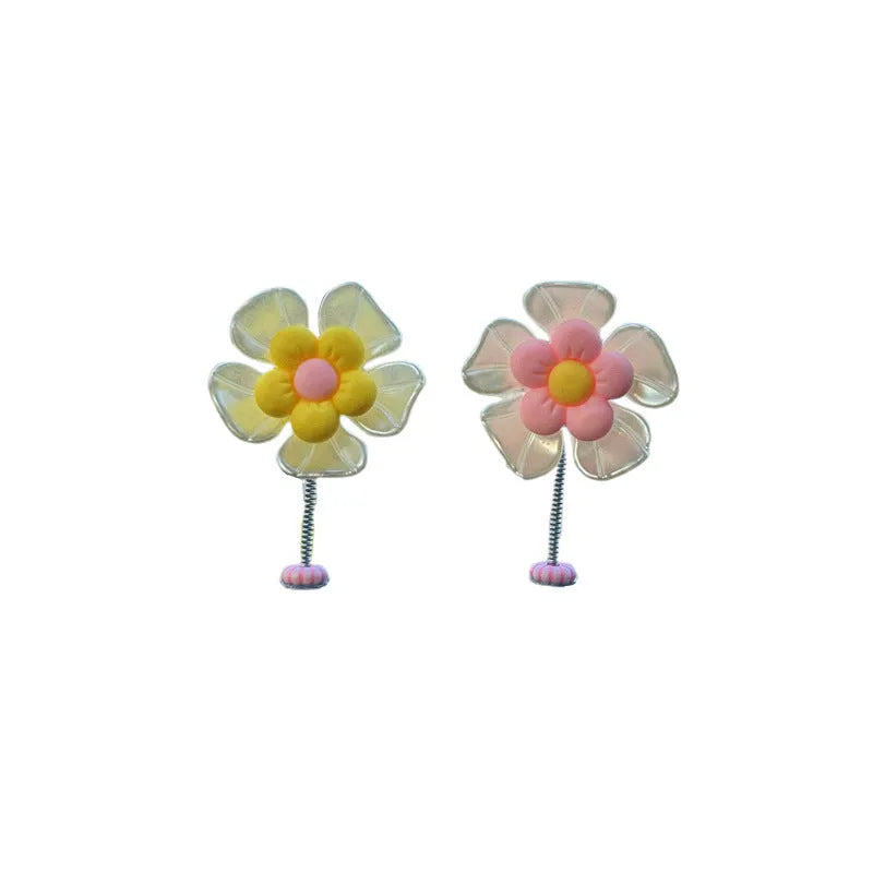 Plastic car swing decoration in choice of five colours measuring 5cm high