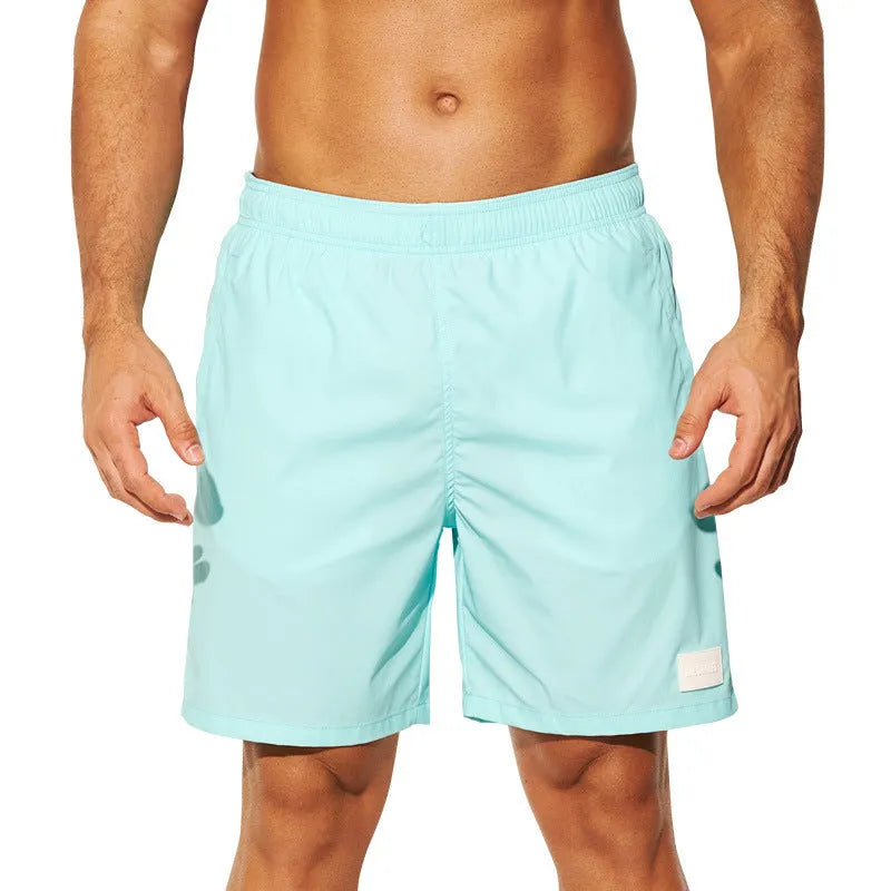Men's quick-drying nylon sports shorts in straight leg style available in multiple colours