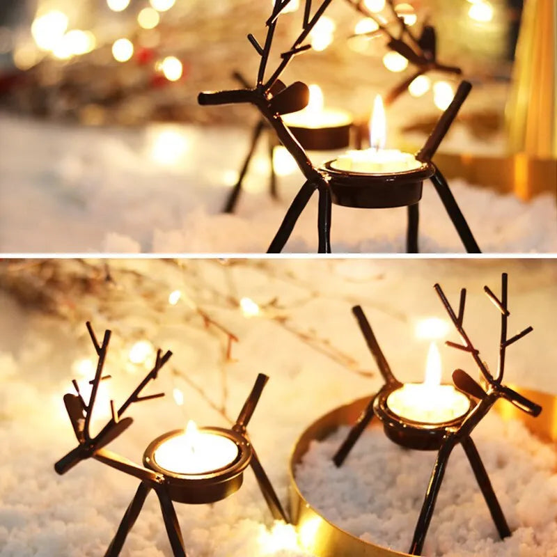 Black iron Christmas candlestick holder with decorative elk antler design.