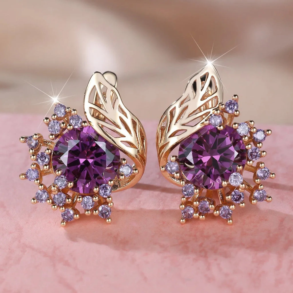 Round floral earrings with feather detailing and coloured zircon stones in champagne gold finish