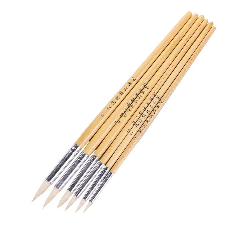 Set of six wooden-handle artistic brushes with wool points for detail drawing and painting