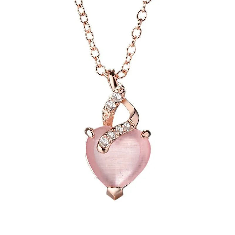 Rose gold electroplated heart-shaped crystal pendant necklace with cross chain design