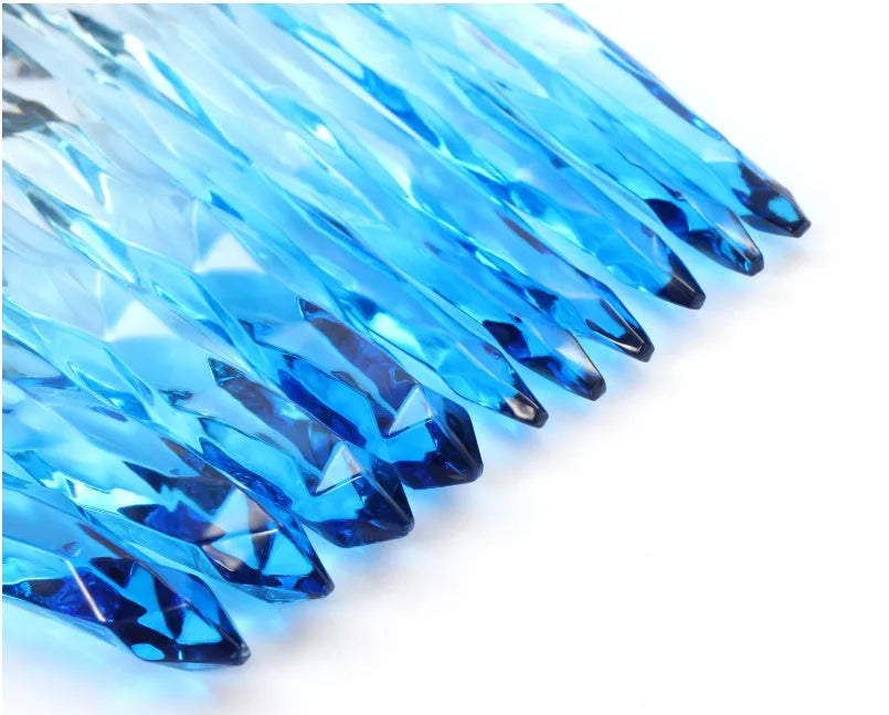 Set of 10 crystal-handled foundation brushes with synthetic bristles laid out flat.